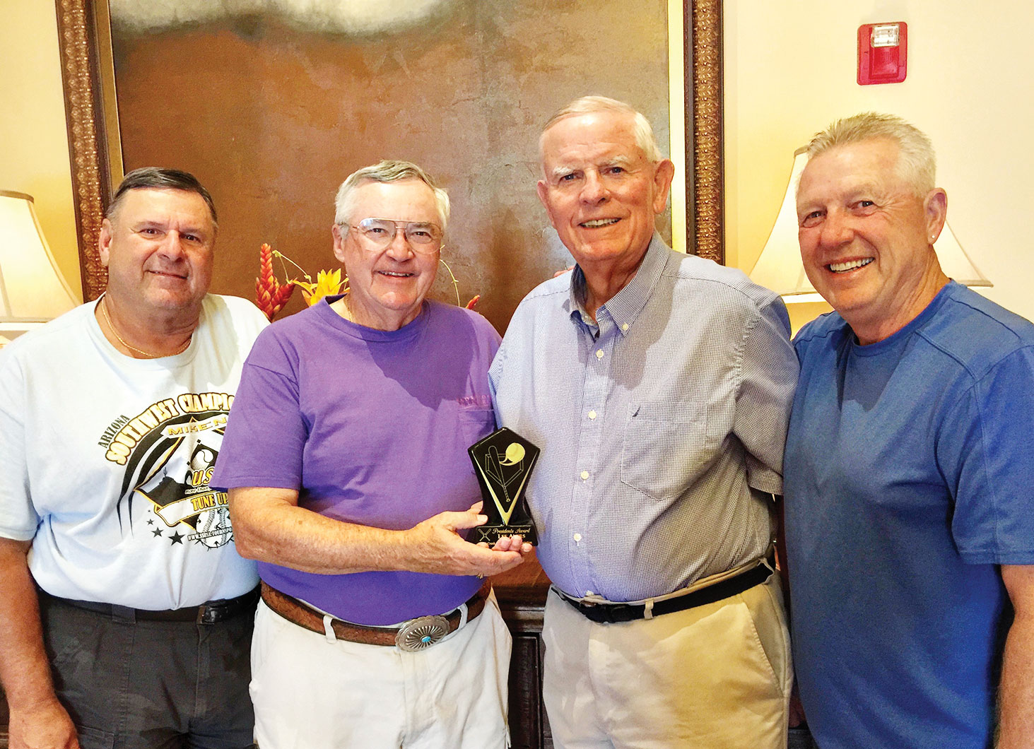 Awardees of this year’s President Award are Dick Gwilt and Lee Ayers, photographed here between President Ken Johnson and incoming President Steve Ward.