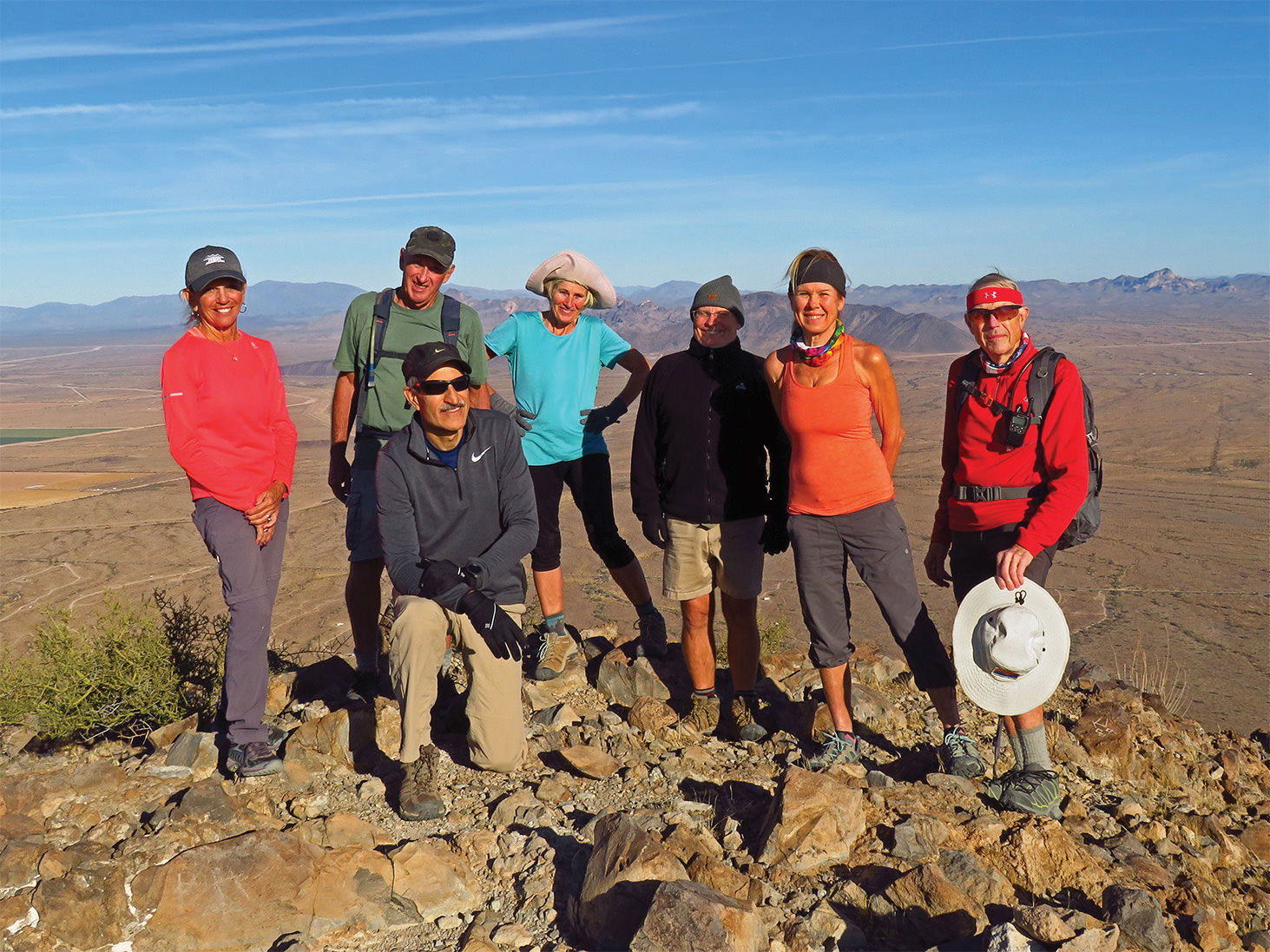 Left to right: Marilyn Reynolds, Clare Bangs, Mike Tansey, Eileen Lords-Mosse, Neal Wring, Kris Raczkiewicz, and Lynn Warren (photographer) enjoying 360-degree views from the summit of Saddle Mountain.