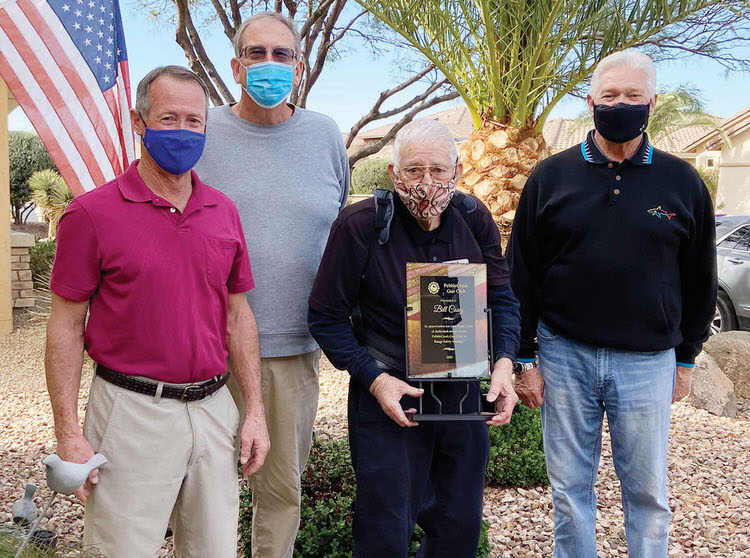 Bill Casey (holding plaque) with PebbleCreek Gun Club officers (left to right) Mitch Counce, Dan Borchers, and Jerry Younker.