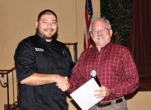 Chef Bernardo Alvear (left) receives award from PCHOA President John Kiekbusch.