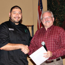 Chef Bernardo Alvear (left) receives award from PCHOA President John Kiekbusch.