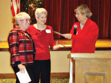 Outgoing 2014 officers MJ Smyrl and Charla Cupit are thanked for a job well done by PC Singles Club President Judy Shaffer, right. MJ served as vice president and membership chairman and was instrumental in designing the club’s attractive new membership brochure. Charla was secretary and will continue as a new member mentor.