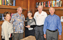 Members of the PebbleCreek HOA Board of Directors congratulate LifeLong Learning for winning a gold award from the National Association of Home Builders. From left: Nancy Wilson Smith, board vice president; John Kiekbusch, board president; Phyllis Minsuk and Dennis DeFrain, LifeLong Learning co-chairs and Gregg Clymer, board secretary.