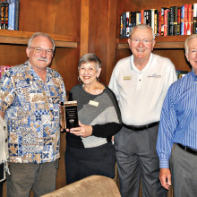 Members of the PebbleCreek HOA Board of Directors congratulate LifeLong Learning for winning a gold award from the National Association of Home Builders. From left: Nancy Wilson Smith, board vice president; John Kiekbusch, board president; Phyllis Minsuk and Dennis DeFrain, LifeLong Learning co-chairs and Gregg Clymer, board secretary.