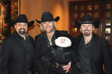 Dan D. Creeker poses with The Texas Tenors in PebbleCreek