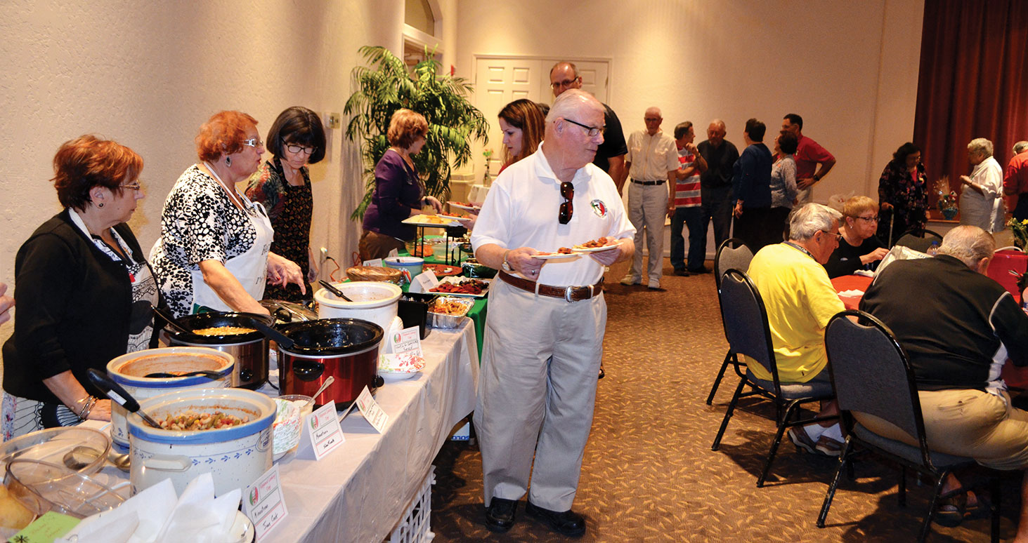 PC Italian Club members and guests enjoying the abundant selections at the February Regional Cooking Day! Mangiare!