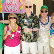 Le Cercle Français members enjoy the Tacky Tiki Bar on March 17, 2015. From left: Dino Cervigini, Lilli Paul, Al Crosson, Robert Risden and Claire Gillet