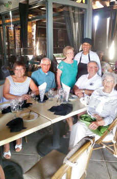 Le Cercle Français members are welcomed by Chef Aurore. From left: Linda Rossetto, Bill Rossetto, Diane Larochelle, Vogue Chef Aurore, Louis Larochelle and Simone Jacobs