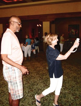Debbie Svoboda being coached by Wii Bowling Master Jerome Sims