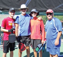 Battling for number one on May 1 were, left to right: Alex Potapoff, Scott Johnson, Rick Reed and Bill Pardue.