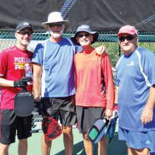 Battling for number one on May 1 were, left to right: Alex Potapoff, Scott Johnson, Rick Reed and Bill Pardue.