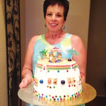 Rose Ann Cleland with her homemade Day at the Beach cake creation.