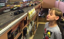 Arthel Zink enjoys the sound of a steam loco on the PCMRC HO-scale layout.