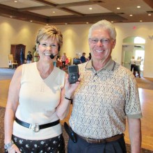 Sharon Scheffer and Jerry Younker proudly use the new sound system.