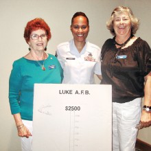 Project Warmheart at Luke Air Force Base is chaired by MSGT Brandy Rucker, center, who spoke to the PC Singles Club in September. With her are PC Singles President Judy Shaffer, right, and member Elizabeth Stelton, left. Project Warmheart and the Homeless Youth Connection are the two charities supported by the club in 2015.