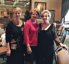 LuJean Anderson, Bev Loding and Ardys Smith waiting to welcome everyone to the GTG Holiday Luncheon