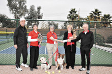 Left to right: Mike Crabtree (2015 President of Pickleball Club), Sarah Marsh (Secretary of Therapy Paws), Jean Reynolds (President and Co-Founder of Therapy Paws), Candy Lawson (Treasurer of Therapy Paws) and Gordon Cooper (2015 Treasurer of Pickleball Club). The dogs are Bess, Finnley, Nelli and Abby.