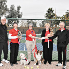 Left to right: Mike Crabtree (2015 President of Pickleball Club), Sarah Marsh (Secretary of Therapy Paws), Jean Reynolds (President and Co-Founder of Therapy Paws), Candy Lawson (Treasurer of Therapy Paws) and Gordon Cooper (2015 Treasurer of Pickleball Club). The dogs are Bess, Finnley, Nelli and Abby.