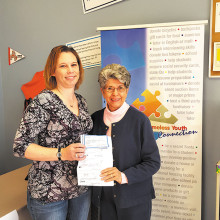 Jane Cook presented donations on behalf of the Christmas Day Potluck amounting to $1,705 to the Homeless Youth Connection.