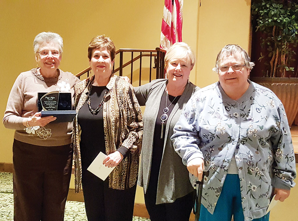 Left to right: Peggy Kuffner, Activities Director, Anita Asp, treasurer, Pat Milich, PR director and Nancy Sheridan, assistant to Peggy (not saying Goodbye)