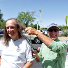Joking around with their friend and fellow PebbleCreek bocce player, Bill Wright and Vivian Klick threaten to cut off William Moser’s long locks with a pair of giant scissors. Also on hand to witness William’s haircut were friends and fellow bocce players Joe and Carolyn Rota, Kenneth and Carrie Cina and Roger Milewski.