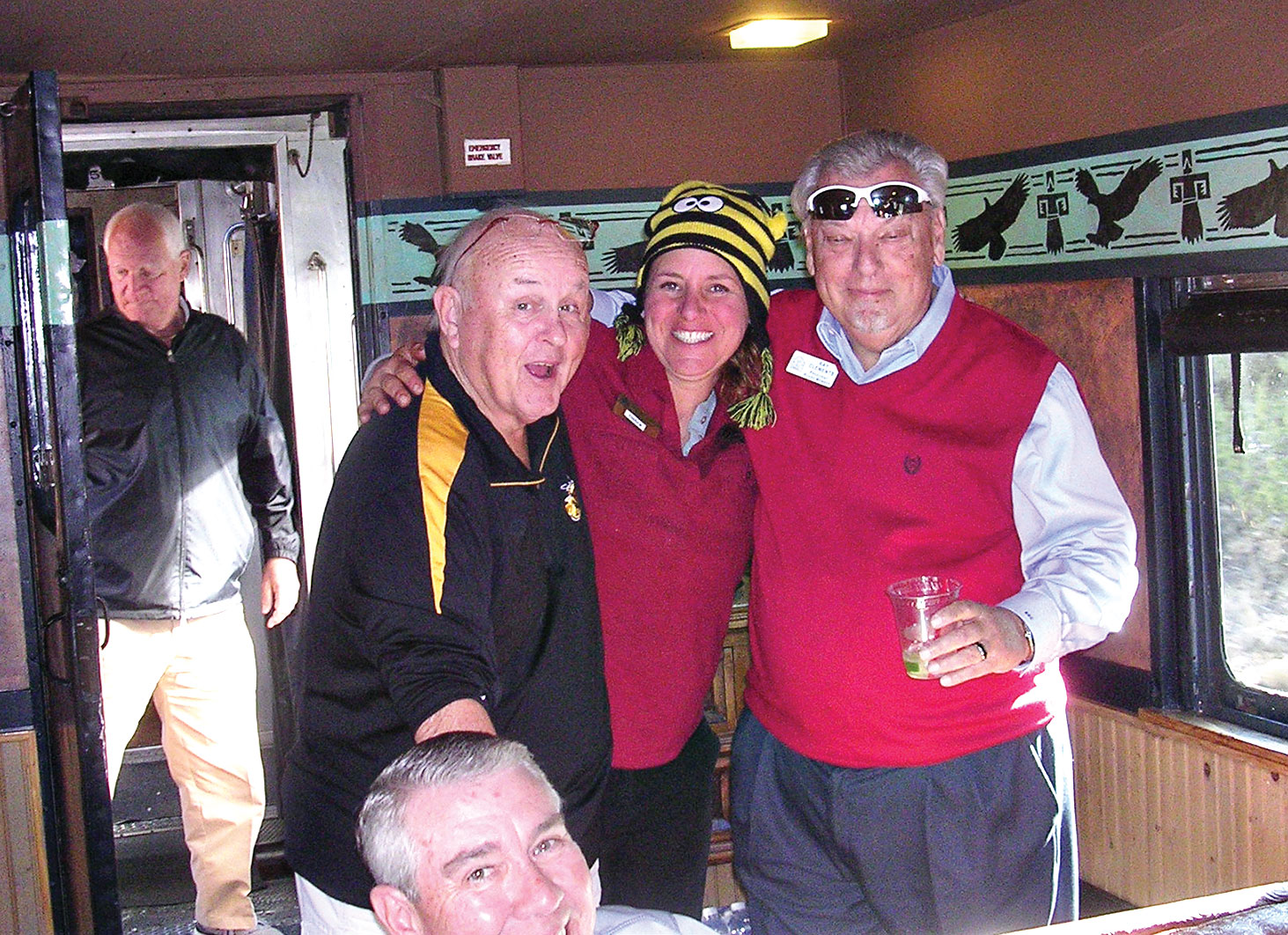 Verde Valley Railroad Tour Director in center with John Ward on left and Ray Clements, PCM9GA President, on right.
