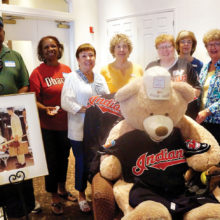 From left: Kare Bears volunteers who received 10 year pins at the Spring Fling volunteer event: Rod Suttles, Carolyn Suttles, Ellen Stergulz, Patti Hodge, Grace Cooper, Jackie Belonax and Sue Chute