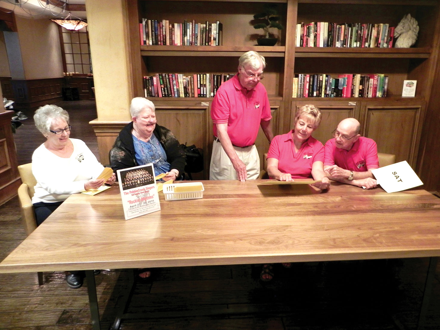 PC Singers’ ticket sellers prepare for first day ticket sale on Saturday, April 2; left to right: Faith Kalback, Linda Adkins, Ken Johannsen, Jill Santy and Bernie Dant.