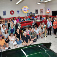 Participants from Shalom Club Road Rally taken inside Martin’s Auto Museum; photo by Allen Levine