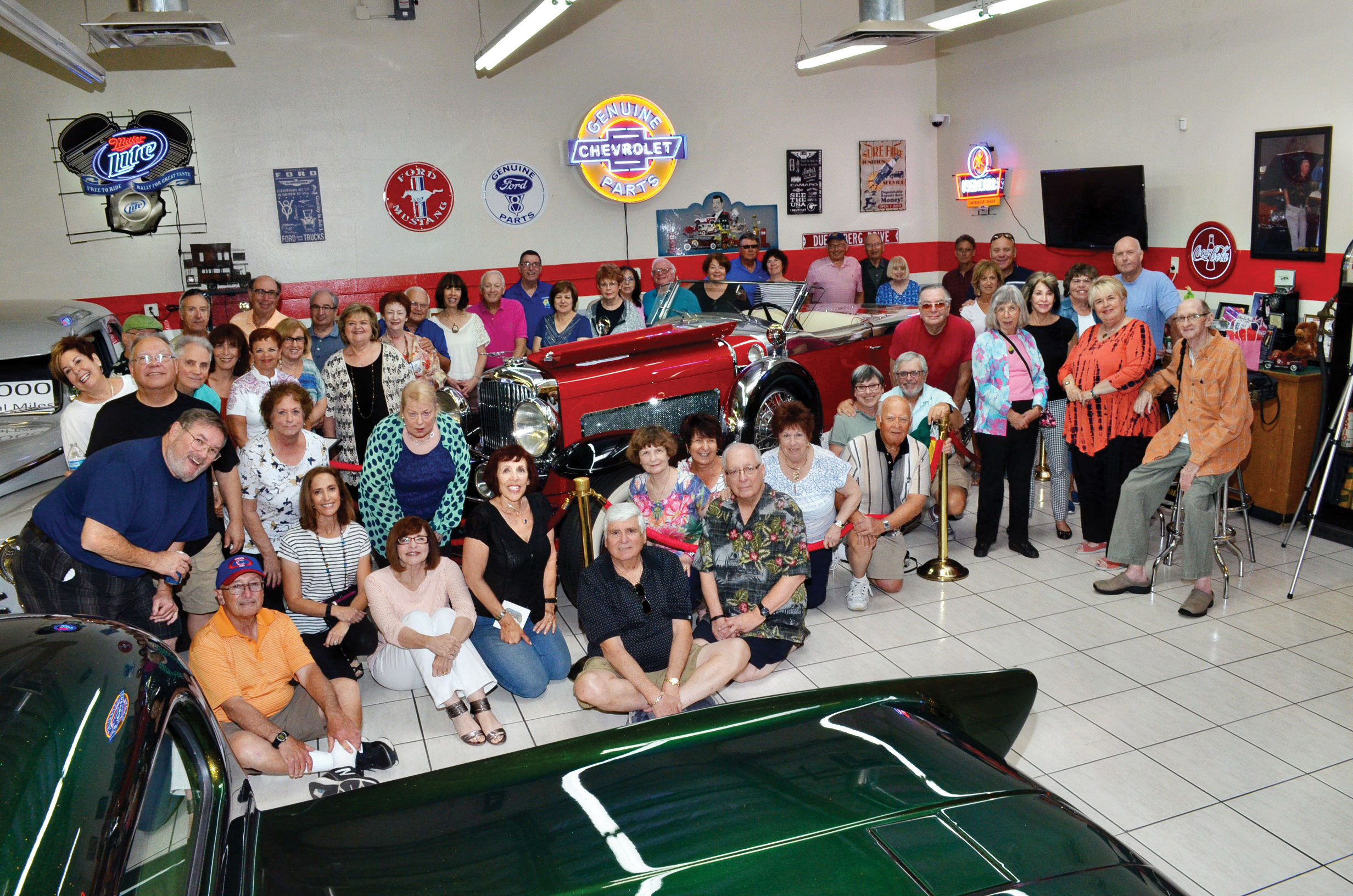 Participants from Shalom Club Road Rally taken inside Martin’s Auto Museum; photo by Allen Levine
