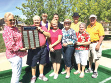 Winter Night League Grand Champion Bocce Knights, front row, left to right: President Cheryl Kasselmann, Captain Dave Ruedlin, Co-Captain Muriel Milewski, Jan Ruedlin, Carol Gwilt and Dick Gwilt; back row: Amy Potapoff, Alex Potapoff and Roger Milewski