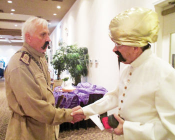 Colonel “Fudgie” Frithingham (Karl Bergstrom) greets Sikh Sadji Wadji (Jerry Layne).