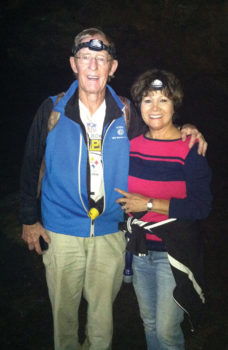 Richard and Cora Hinkel hike in the lava tube in Flagstaff
