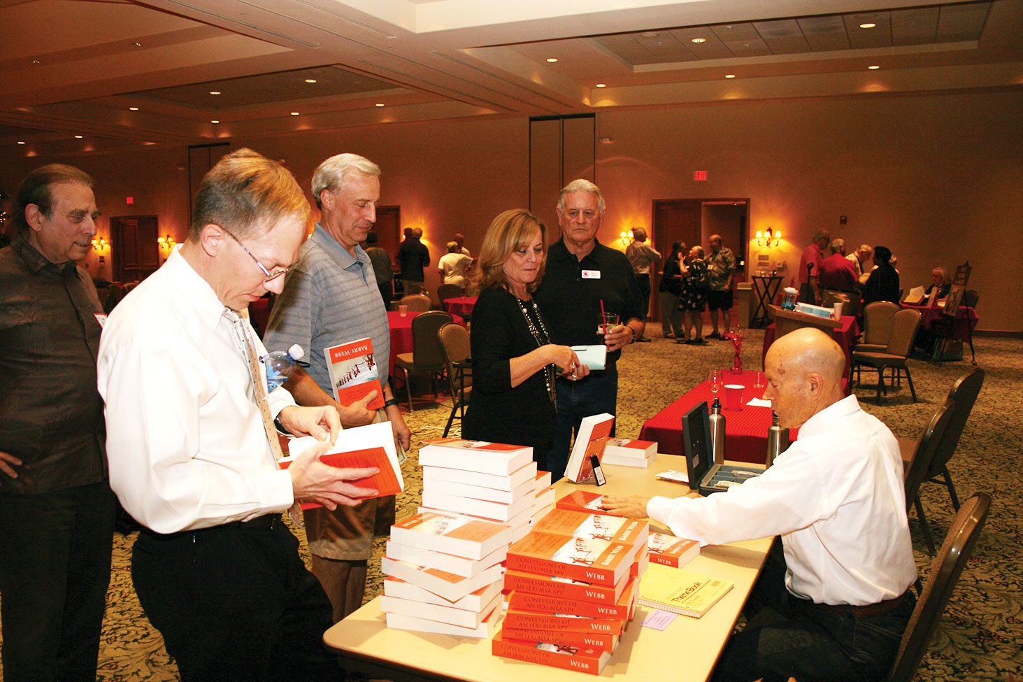 Members purchasing signed copies of Barry Webb’s book Confessions of an (Ex) NSA Spy.