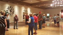 PebbleCreek Singles learn to Square Dance at their Oktoberfest.