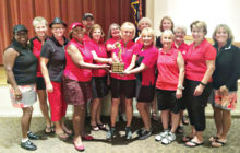 Eagle’s Nest Team - Winner of Robson Challenge Trophy: back row, left to right: Emma Mosley (co-chair), Cindy Tollefson, Kathy Hubert-Wyss, Ronnie Decker, Carol Sanders, Pat Laatsch, Jane Wiederhold, Elaine Carlson, Sue White, Judy Newell (co-chair); front row: Carolyn Suttles, Kittie Day, Debbie Sayre, Donna Havener, Becky Rio