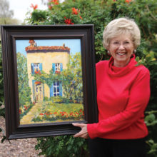 Loretta Brenneman with her painting Inviting