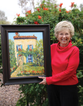 Loretta Brenneman with her painting Inviting