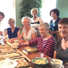 The book club group, left to right: Priscilla Naworski, Carole Korzilius, Karen Ludwig, Diane McManis and Lois Tronzo; back row: Jo Werner, Ann Goodale