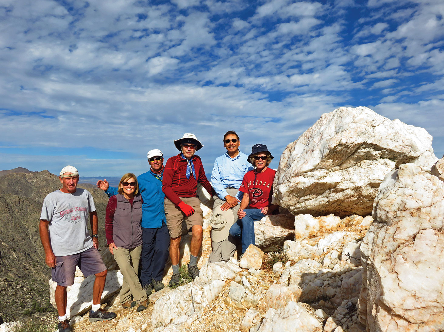 Left to right: Clare Bangs, Donna and Jeff Gillen, Lynn Warren (photographer), Ed Kim and Vicki Carter are surrounded by brilliant white on the summit of Quartz Peak.