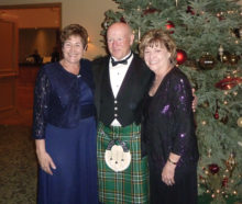 Greeters at the Irish-American Club Christmas Ball were clad in kilts.