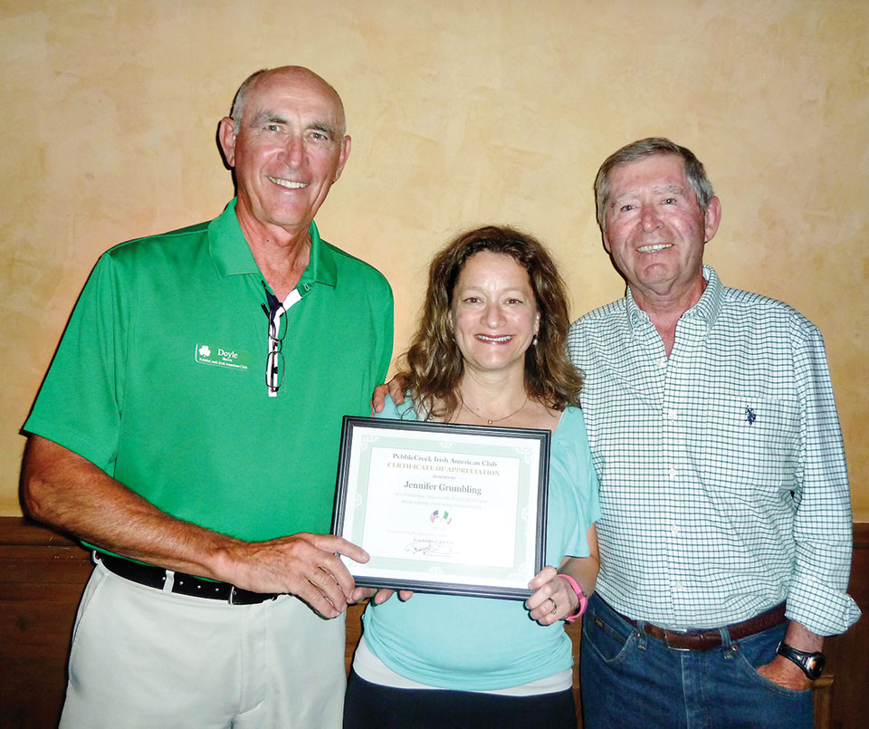 Left to right: PCIAC President Doyle Brown, Guidance Counselor Mrs. Grumbling with a Certificate from the club and Jim McKenna, co-chair of the Charitable Contributions Committee.