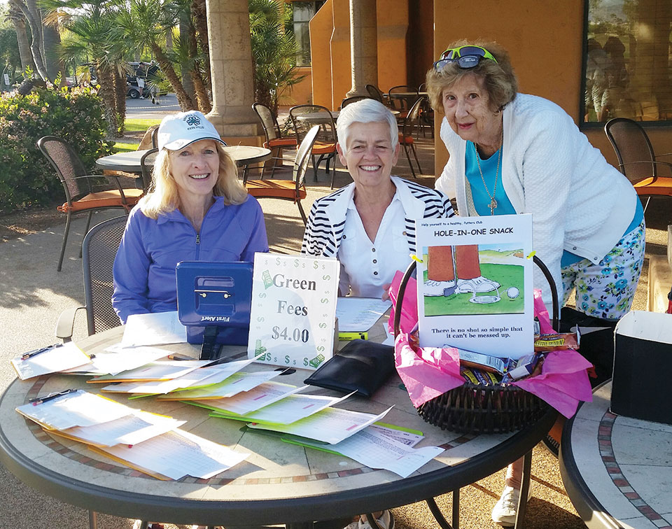 Carol Taylor, Sharon Ribary and Bettyann Baumgartner check in the Putters.