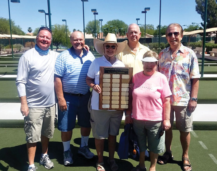 Members of the United 40 team which won the championship of the Spring Day League are (left to right), back row: Bill Gavin, Chris Mucha, Gerald Oakes, Tony Monzo; front row presenting the award: Cheryl Kasselmann and Carol Gwilt; not pictured are Jeff Young and Dan Zeh