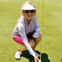 Debbie Sayre with her hole-in-one ball