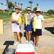 Left to right: Cheryl Skummer, Deb Smedley and Layne Sheridan enjoyed cool towels during a summer round on the course.