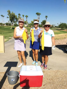 Left to right: Cheryl Skummer, Deb Smedley and Layne Sheridan enjoyed cool towels during a summer round on the course.