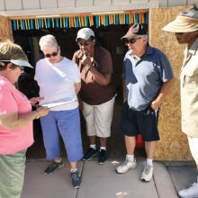 Bocce Ball Association Statistician Carol Gwilt (left) reviews some of the rules with new players Pat Moy, Carolyn Scott, Mike Lewandowski and Laray Bryant on Monday, September 25 at the Bocce Complex located at Eagle’s Nest.