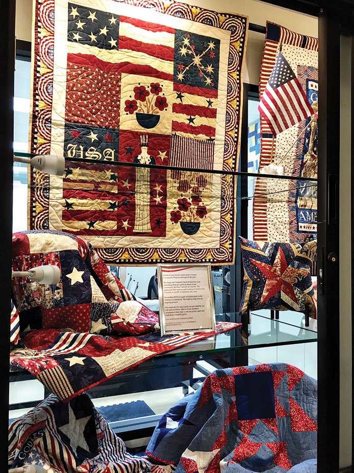 Veterans are recognized with a red, white and blue quilt PebbleCreek Post