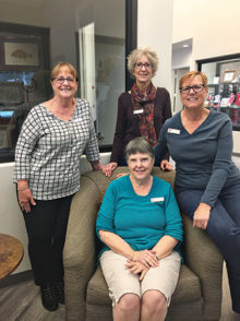 The officers are current president, Karen Bogadi (seated) and (left to right) Donna Holbeck, treasurer; Nancy Kyle, secretary and Vicki Ray, vice president.